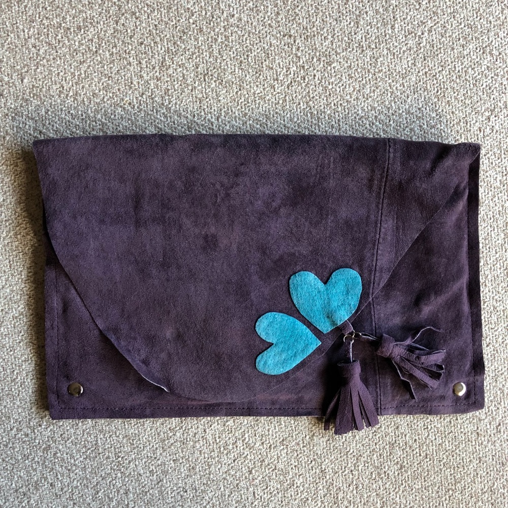 Purple suede clutch with turquoise hearts